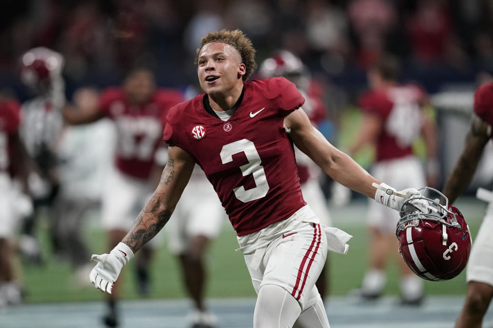 Alabama wide receiver Jermaine Burton (3) celebrates after a win against Georgia after the Southeastern Conference championship NCAA college football game in Atlanta, Saturday, Dec. 2, 2023. (AP Photo/Mike Stewart)