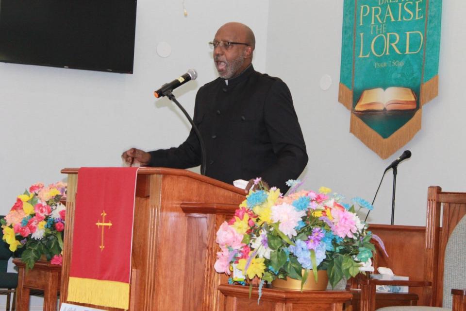 The Rev. Michael Doby of Carter Tabernacle Christian Methodist Episcopal Church in Orlando delivers the sermon at the Blessing of the Badges service held Sunday at DaySpring Baptist Church.