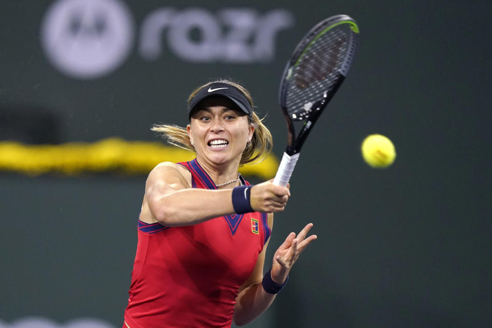 Paula Badosa, of Spain, hits a forehand to Angelique Kerber, of Germany, at the BNP Paribas Open tennis tournament Thursday, Oct. 14, 2021, in Indian Wells, Calif. (AP Photo/Mark J. Terrill)