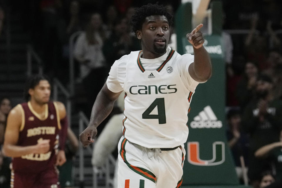 Miami guard Bensley Joseph (4) gestures after scoring during the second half of an NCAA college basketball game against the Boston College , Wednesday, Jan. 11, 2023, in Coral Gables, Fla. (AP Photo/Marta Lavandier)