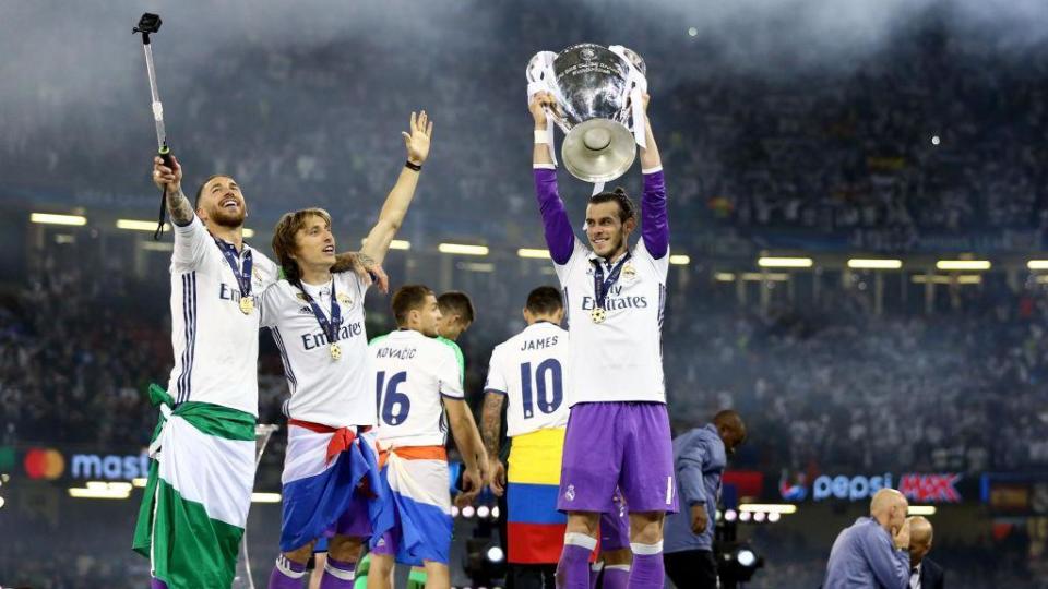 Sergio Ramos, Luka Modric and Gareth Bale of Real Madrid taking a selfie with the trophy the UEFA Champions League Final