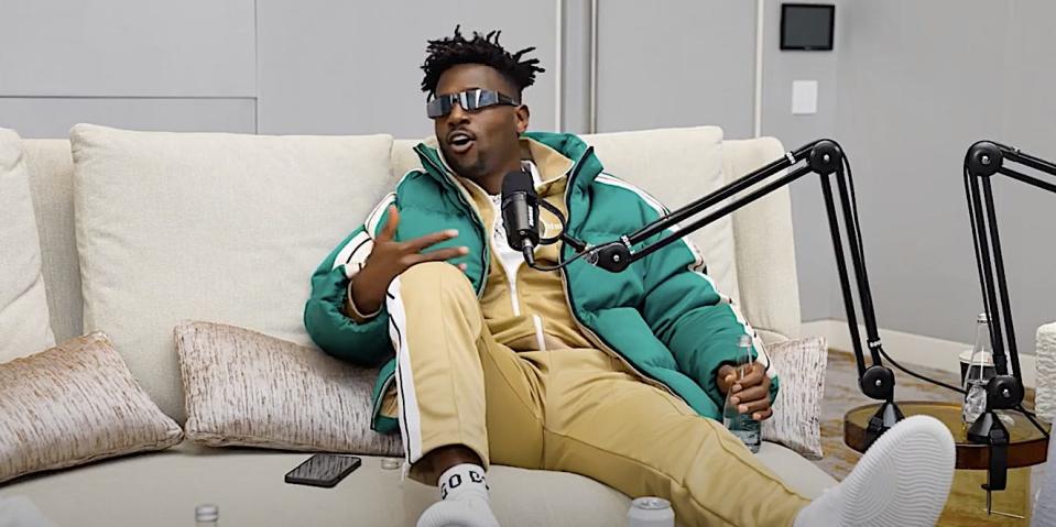 A screenshot shows Antonio Brown sitting on a couch speaking on the "Full Send" podcast.