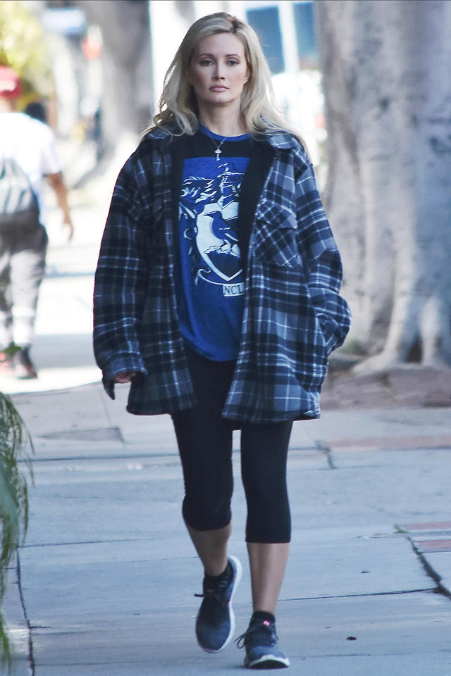 Kristen Stewart bundles up as she braves rainy weather in Los Angeles to go  for a walk with a friend