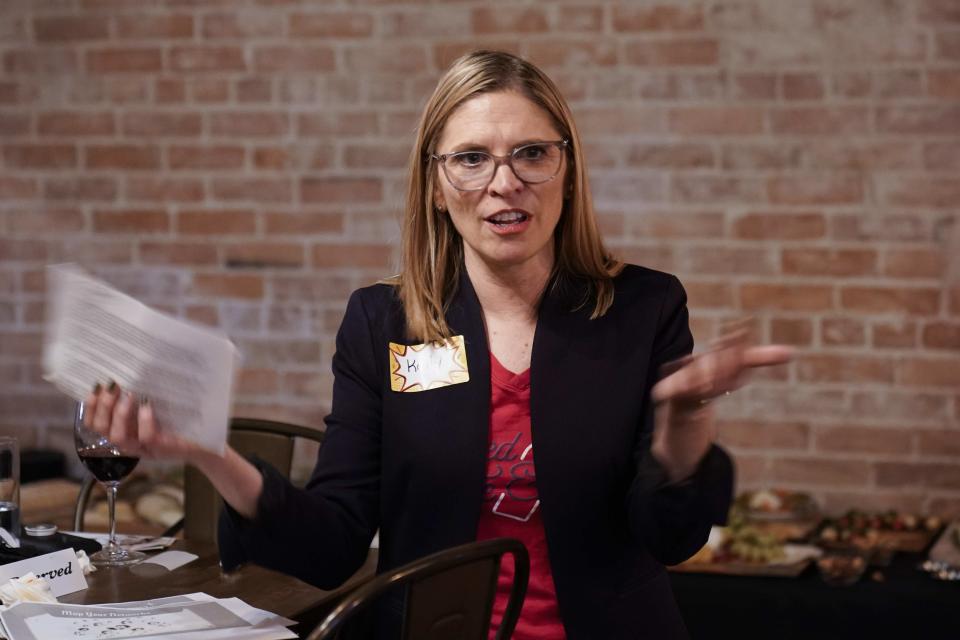 Kelly Dillaha talks during a Red Wine and Blue event in Utica, Mich., Tuesday, Sept. 20, 2022. (AP Photo/Paul Sancya)