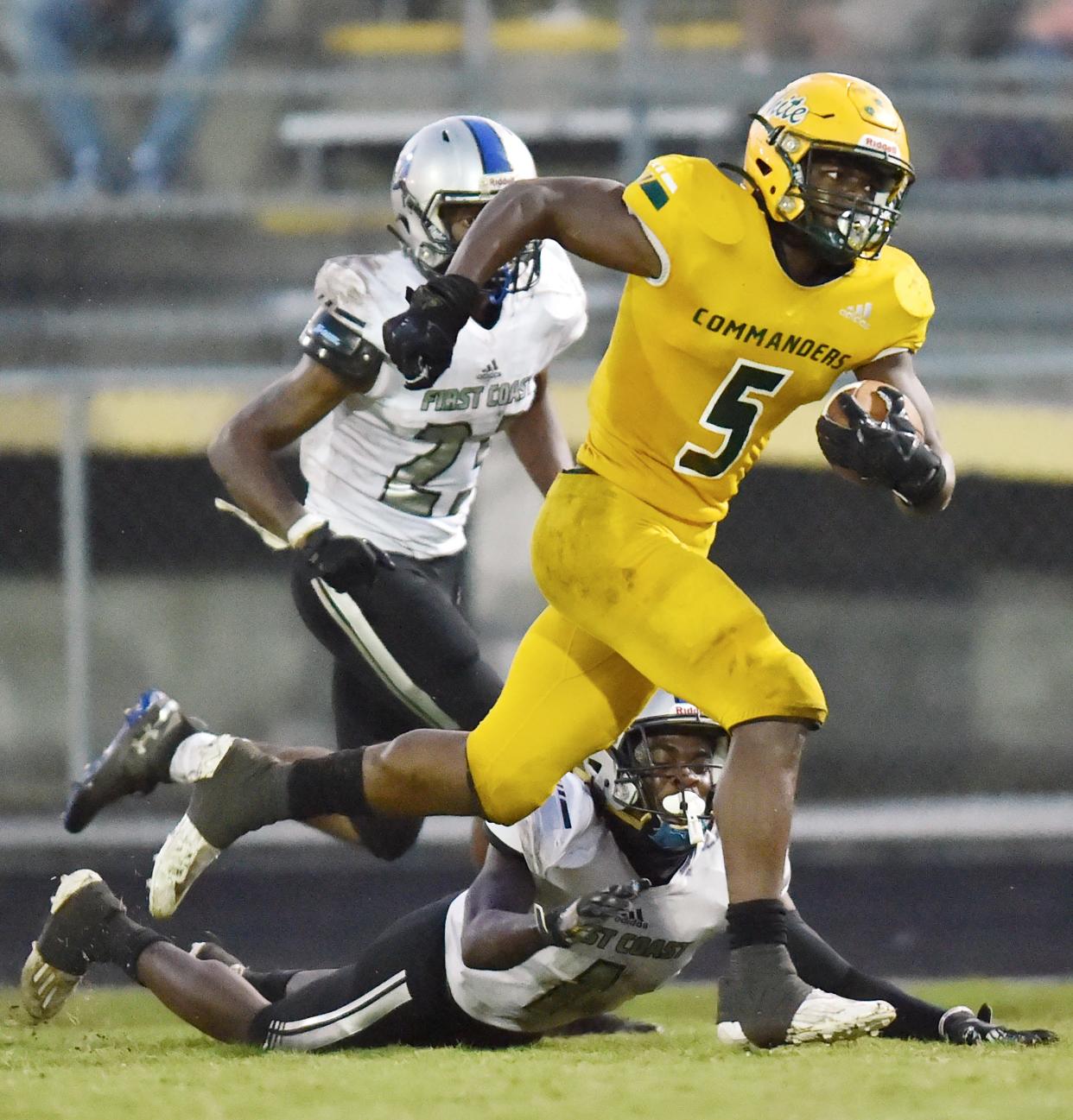 Ed White's Davaughn Patterson dashes past First Coast defenders on his way to a second-quarter touchdown in September 2021.