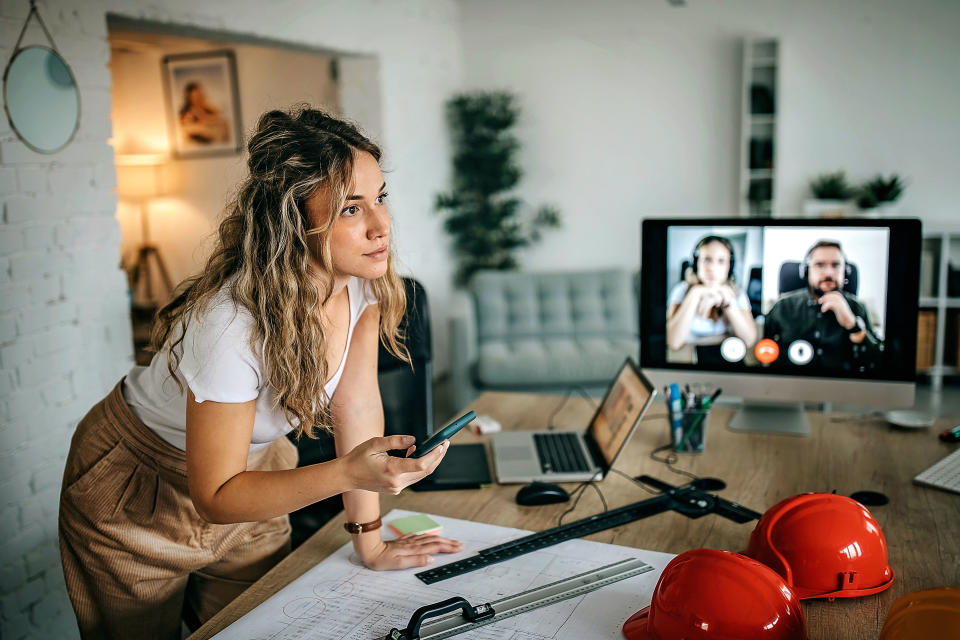 Business people having video meeting with customer