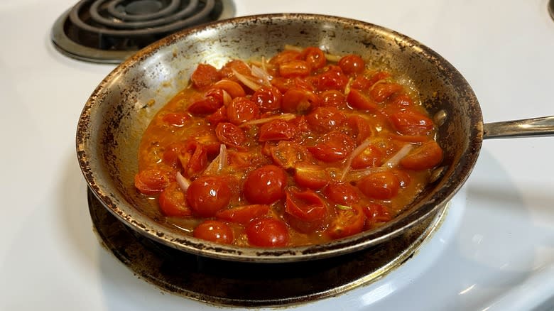 stainless steel skillet filled with tomato sauce