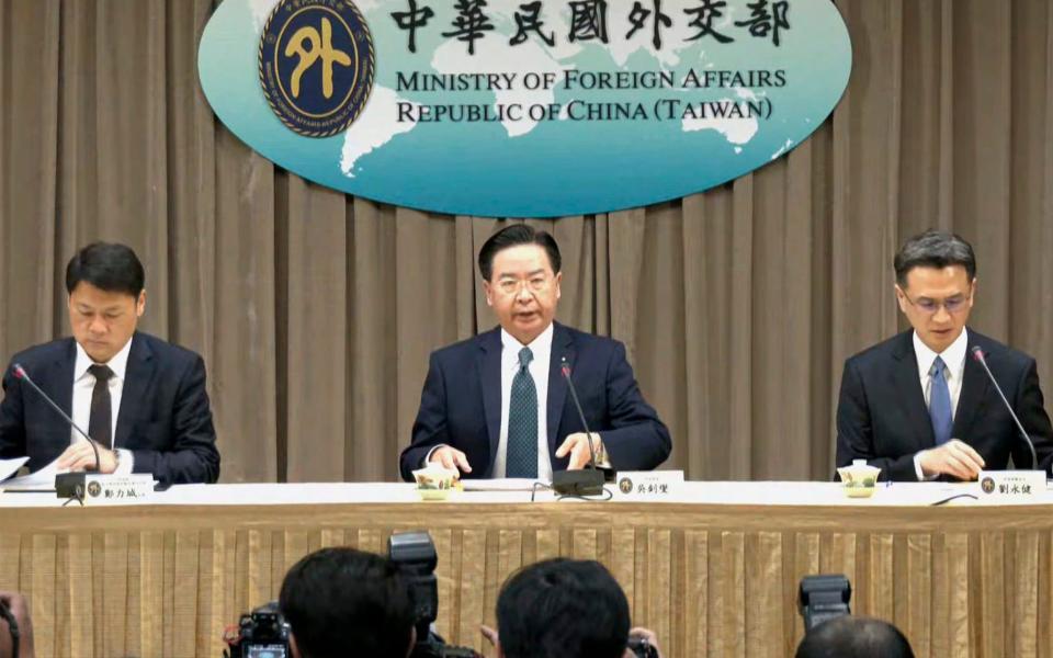 Taiwan Foreign Minister Joseph Wu, centre, at the press conference - Taiwan Ministry of Foreign Affairs
