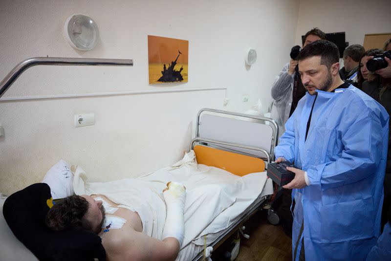 Ukraine's President Zelenskiy and Denmark's PM Frederiksen visit Ukrainian servicemen at a military hospital in Mykolaiv