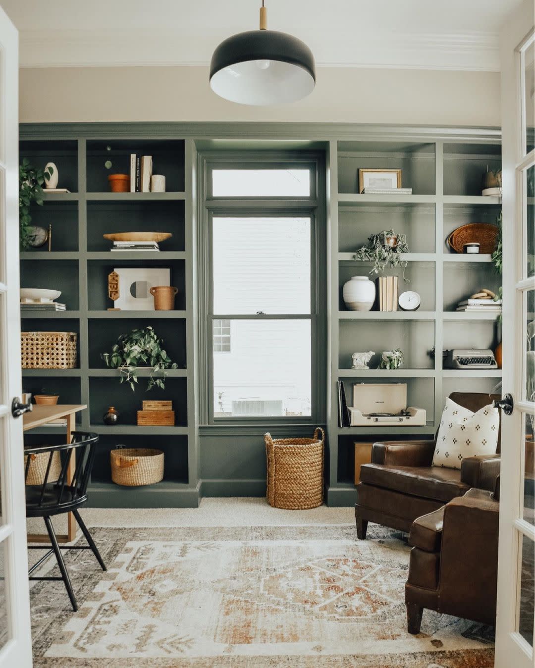 a room with shelves and a couch