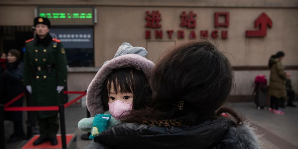 Wuhan virus China Beijing railway station