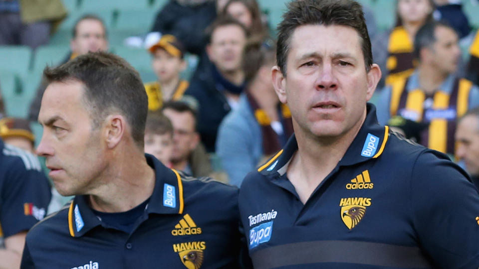 Alastair Clarkson and Brett Ratten, pictured here before a Hawthorn game in 2015.