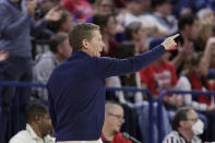 Gonzaga head coach Mark Few directs his team during the first half of an NCAA college basketball game against Washington, Friday, Dec. 9, 2022, in Spokane, Wash. (AP Photo/Young Kwak)