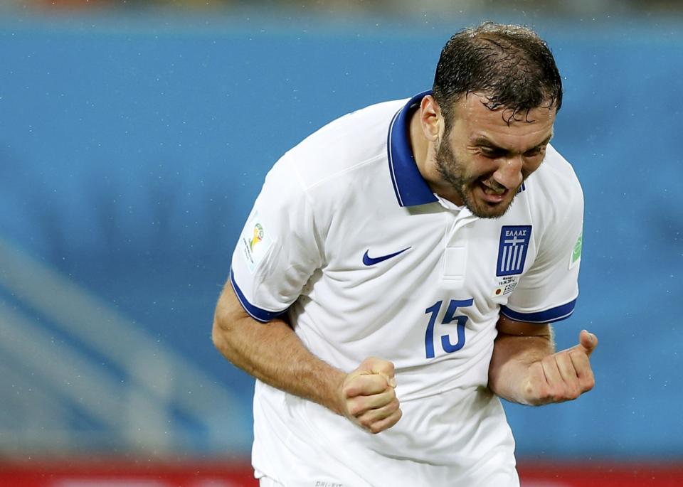 Greece's Vasilis Torosidis reacts after failing to score during their 2014 World Cup Group C soccer match against Japan at the Dunas arena in Natal June 19, 2014. REUTERS/Toru Hanai