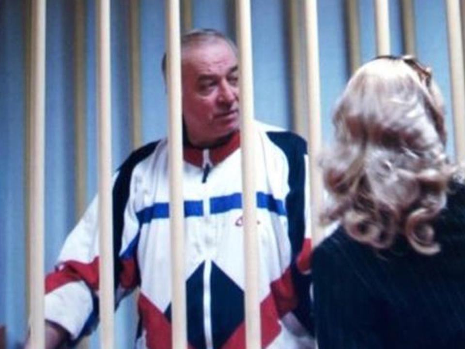 Sergei Skripal talks to his lawyer from behind bars in 2006 (AP)