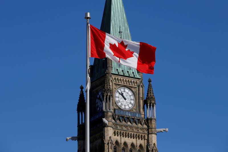 FILE PHOTO: Canadian flag flies in front of the Peace Tower on Parliament Hill in Ottawa