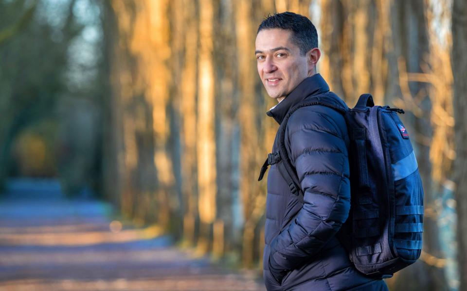 Dr Philip Borg, 40, does daily 'rucking' - walking with a weighted backpack