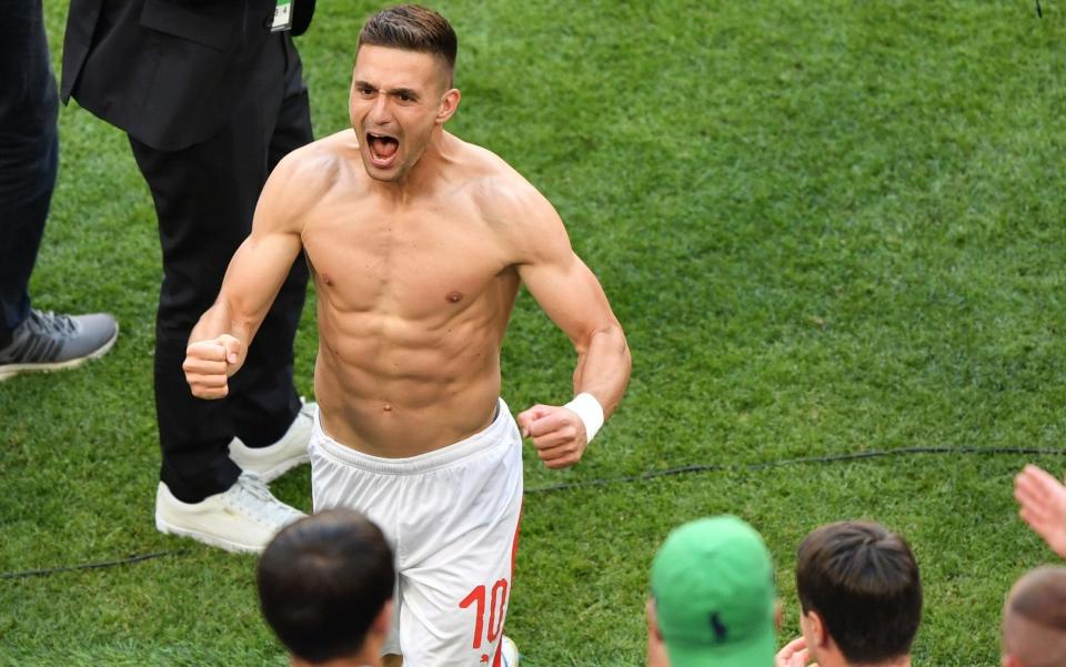 Dusan Tadic is currently playing in the World Cup with Serbia - AFP