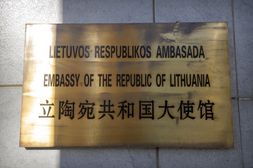 FILE - The nameplate for the Lithuanian Embassy is seen on the outside of the embassy building in Beijing, on Dec. 16, 2021.