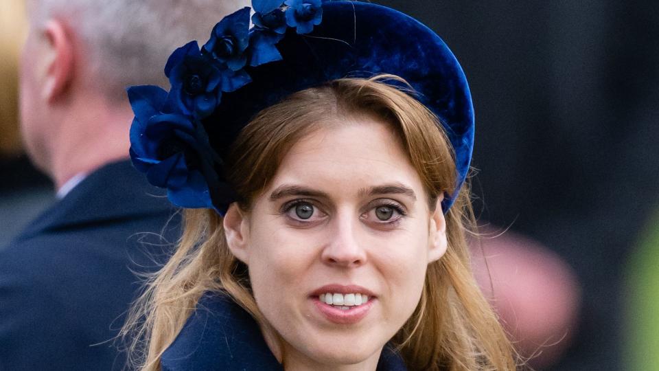 Princess Beatrice at Christmas Day event in navy headband