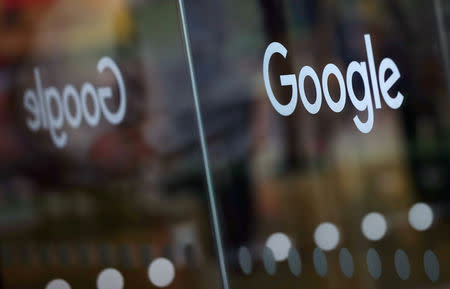 FILE PHOTO: The Google logo is pictured at the entrance to the Google offices in London, Britain January 18, 2019. REUTERS/Hannah McKay/File Photo