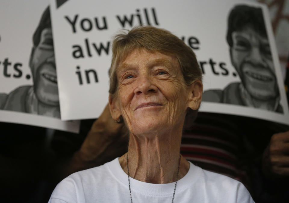 Australian Roman Catholic nun Sister Patricia Fox reacts during a news conference before her departure for Australia Saturday, Nov. 3, 2018, in Manila, Philippines. Sister Fox decided to leave after 27 years in the country after the Immigration Bureau denied her application for the extension of her visa. The Philippine immigration bureau has ordered the deportation of Fox who has angered the president by joining anti-government rallies. (AP Photo/Bullit Marquez)