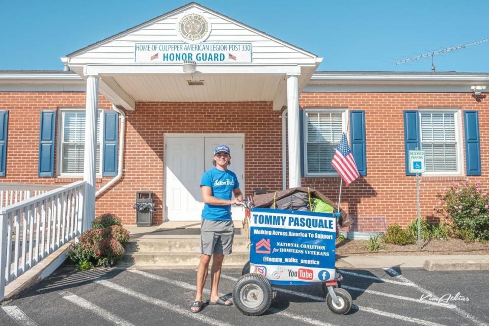 Randolph native Tommy Pasquale outside an American Legion Post in Culpepper, Virginia. He's pushing his cart across the country to raise funds for homeless veterans.