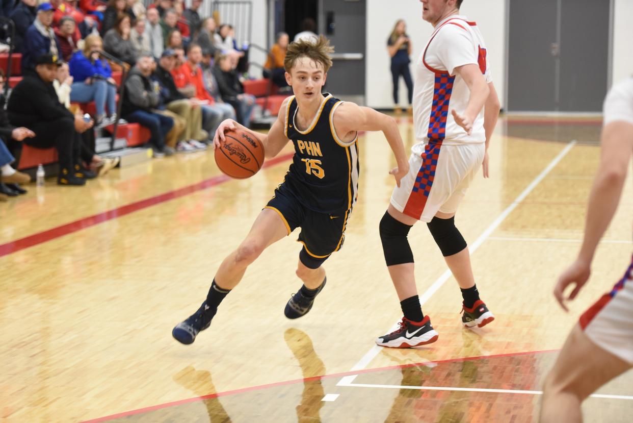 Port Huron Northern's Cam Harju drives the lane during a game earlier this season.