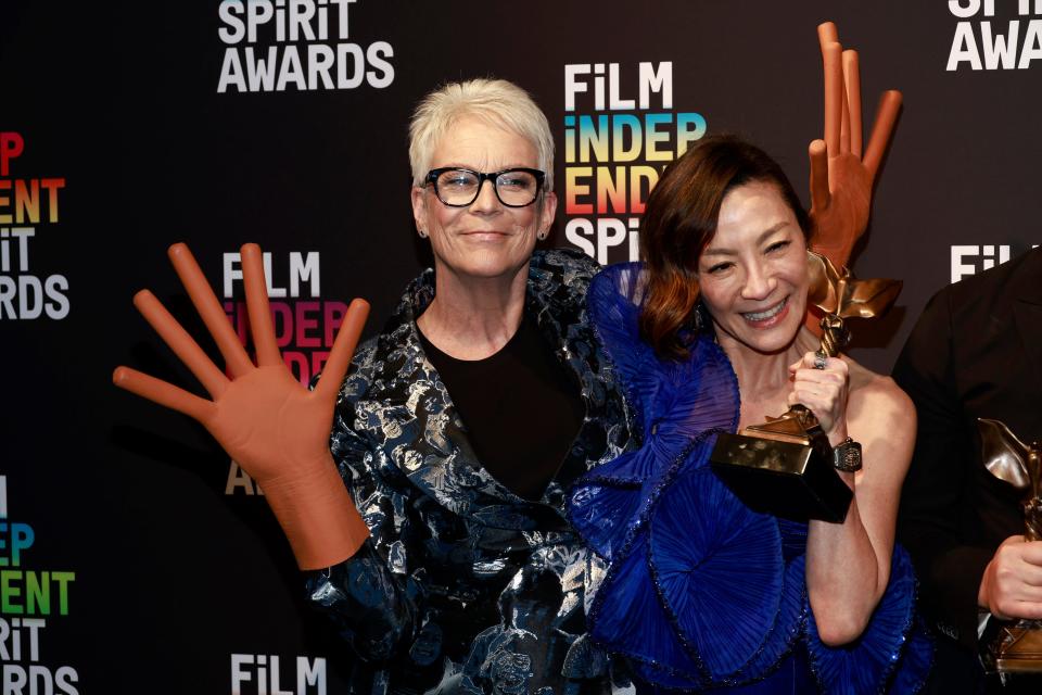 Jamie Lee Curtis and Michelle Yeoh, winners of the best feature award for “Everything Everywhere All at Once,” pose in the media room during the 2023 Film Independent Spirit Awards.