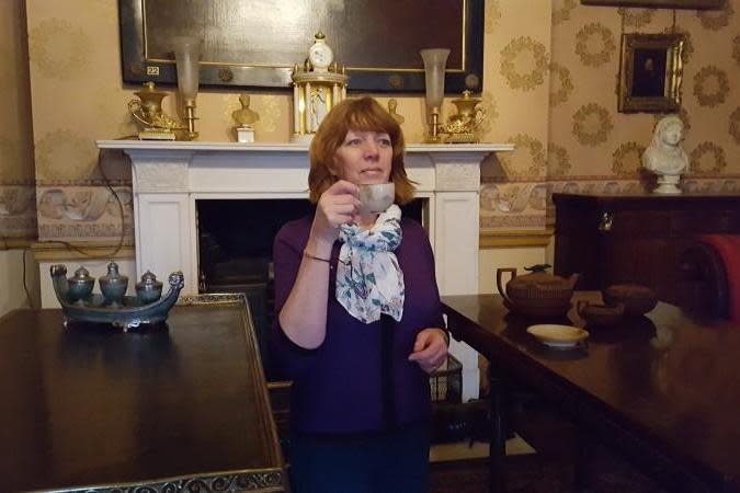 Helen Pratt, assistant community curator, in the Terrace Room at Temple Newsam House. The room contains desks once owned by the famous Earl Grey: Temple Newsam