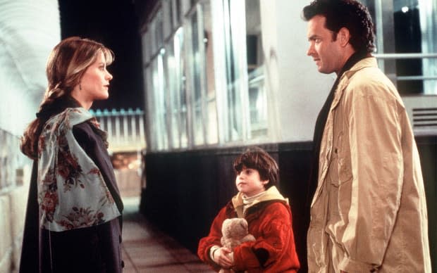 Meg Ryan, Ross Malinger and Tom Hanks in "Sleepless in Seattle"<p>Entertainment Pictures/Alamy Stock Photo</p>