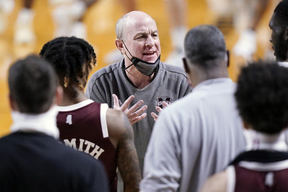 Mississippi State head coach Ben Howland talks to his players during a win over Vanderbilt in the second half of an NCAA college basketball game Saturday, Jan. 9, 2021, in Nashville, Tenn. (AP Photo/Mark Humphrey)