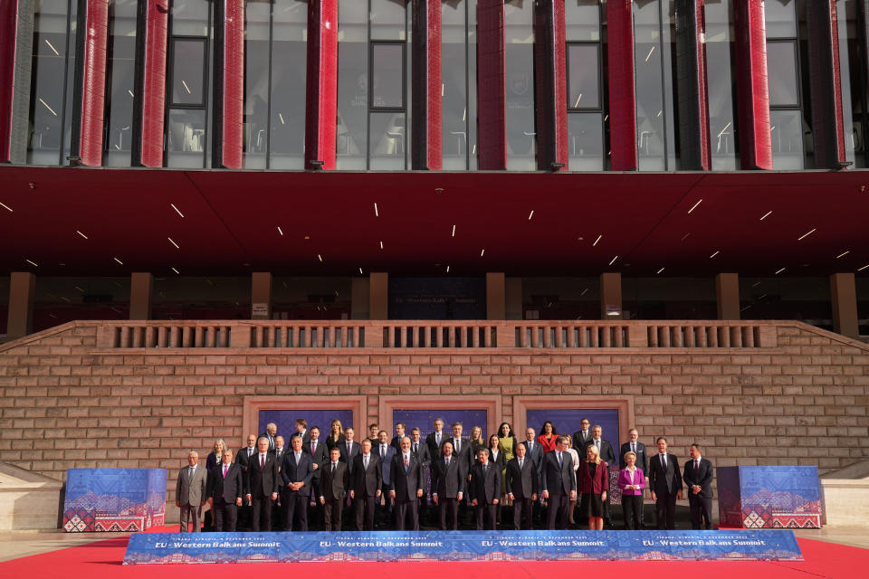 European Union and Western Balkan leaders pose during a group photo at an EU-Western Balkans Summit, in Tirana, Albania, Tuesday, Dec. 6, 2022. EU leaders and their Western Balkans counterparts gathered Tuesday for talks aimed at boosting their partnership as Russia's war in Ukraine threatens to reshape the geopolitical balance in the region. (AP Photo/Andreea Alexandru)