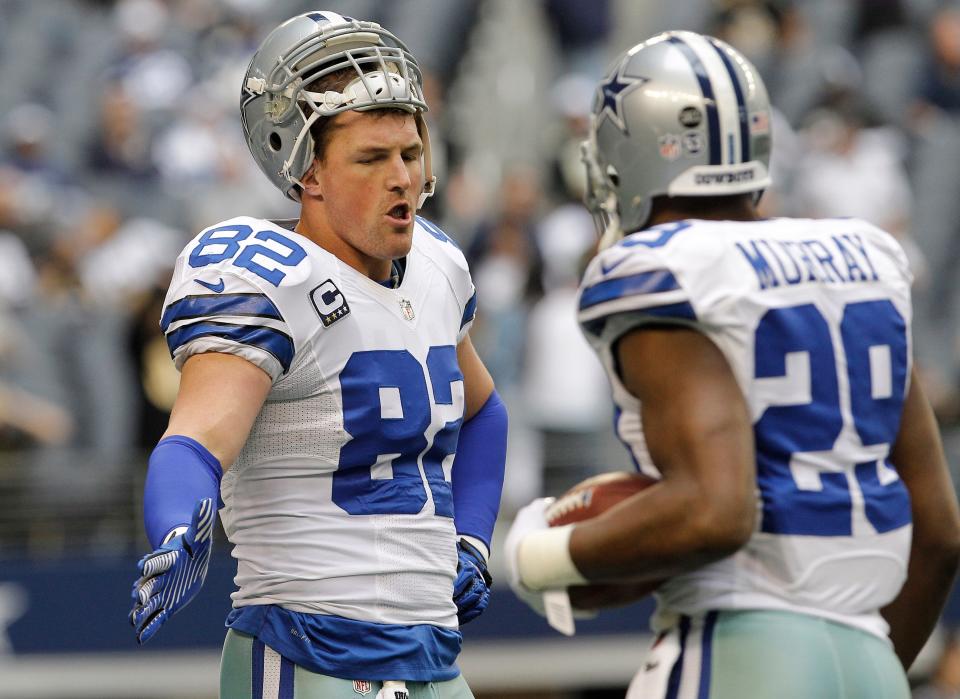 Tight end Jason Witten (82) warms up with a Dallas teammate Dec. 23, 2012 in Arlington, Texas. Witten played 16 seasons for the Cowboys.
