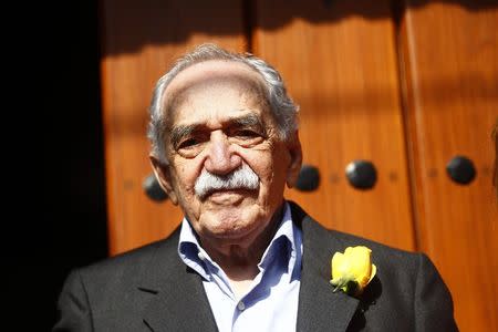 Colombian author Gabriel Garcia Marquez stands outside his house on his 87th birthday in Mexico City March 6, 2014. REUTERS/Edgard Garrido