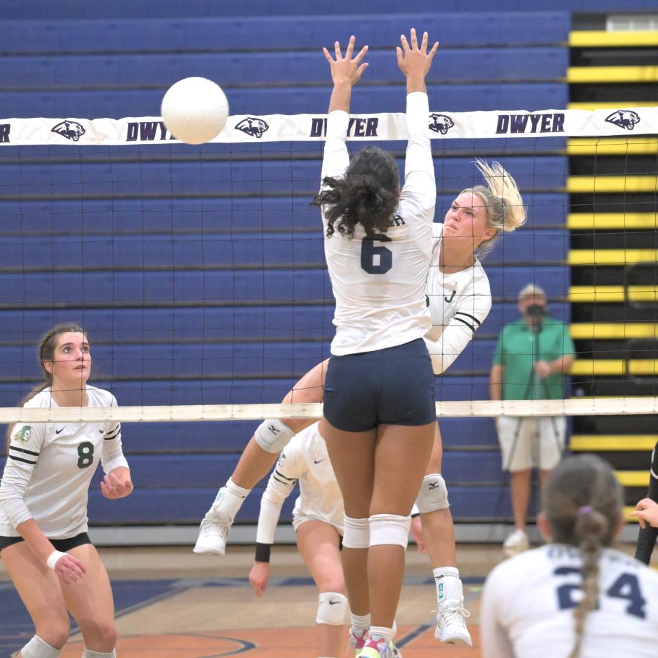 Jupiter’s Lexi Figoras sends the ball across the net as Dwyer’s Inaya Wilkins tries to block on Oct. 5, 2023.