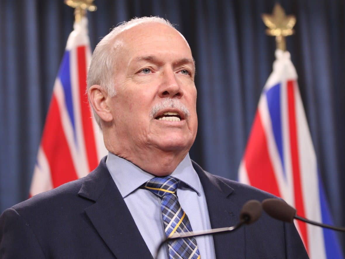 Premier John Horgan answers questions during a news conference in the press theatre at the legislature in Victoria, Friday, March 11, 2022. (Chad Hipolito/The Canadian Press - image credit)