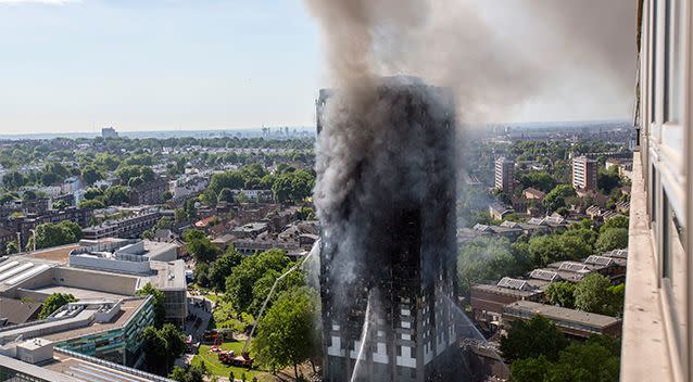 The building is continuing to smoulder many hours after the blaze began. Photo: AP