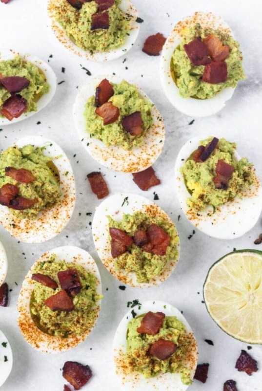 <p>Organically Addison</p><p>These deviled eggs are made with avocado and bacon! They are hearty, savory and healthy. They are Whole30-approved and Paleo all while being creamy and smooth.</p><p><strong>Get the recipe:</strong><a href="https://organicallyaddison.com/keto_deviled_eggs_recipe_paleo/" rel="nofollow noopener" target="_blank" data-ylk="slk:Keto Deviled Eggs;elm:context_link;itc:0;sec:content-canvas" class="link "> <strong>Keto Deviled Eggs</strong></a></p>