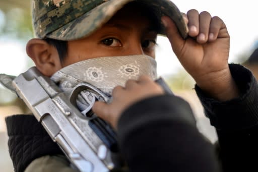 The children train for a few hours every week under the supervision of a militia member