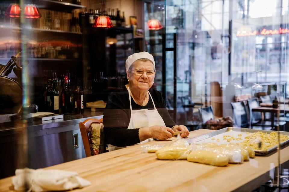 Nonna Dora making pasta at her pasta bar in NYC