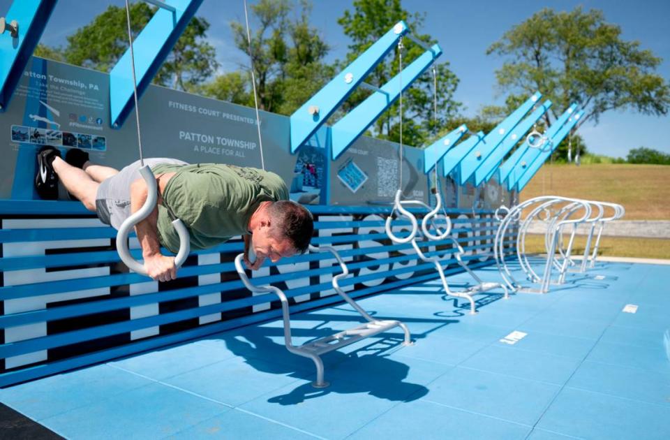 Patton Township police Sgt. Brian Shaffer demonstrates some of the features of the new FitCourt at Bernel Road Park on Tuesday, May 21, 2024.