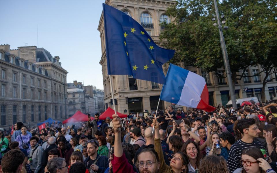 Supporters of the left wing union, New Popular Front, gather at the Place de la Republique