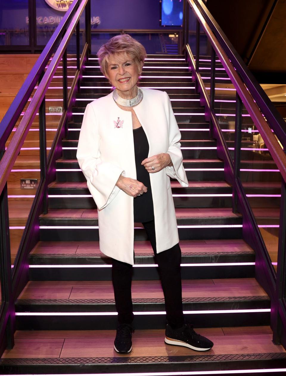 gloria hunniford accepts £26,000 donation for pinktober