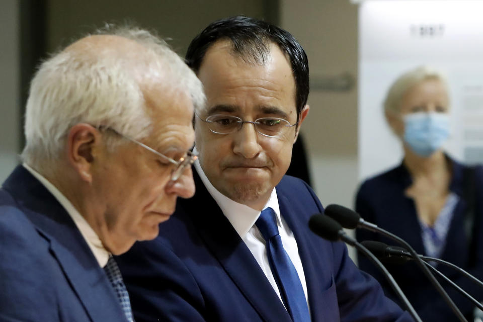 The European Union's Foreign Policy Chief Josep Borrell, left, and Cyprus' Foreign Minister Nikos Christodoulides speak during a joint news conference at the Cypriot foreign ministry on Thursday, June 25, 2020. Borrell is in Cyprus to discuss developments in the EU's southeastern-most corner. (AP Photo/Petros Karadjias)