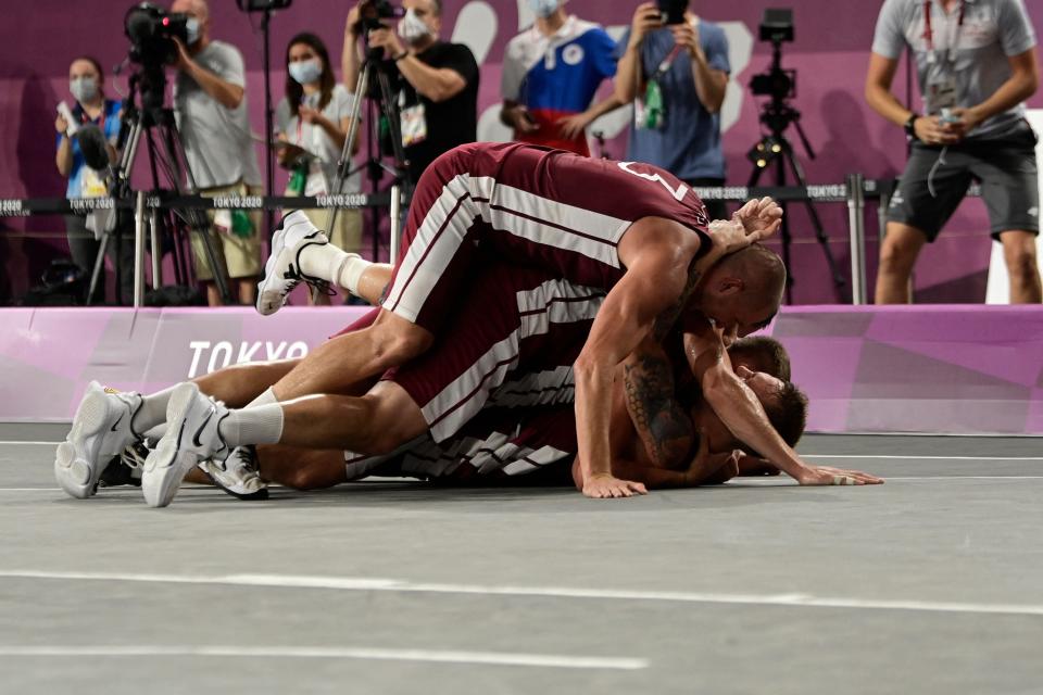 Latvia celebrate their dramatic gold-winning performance in the men’s 3x3 final (AFP/Getty)