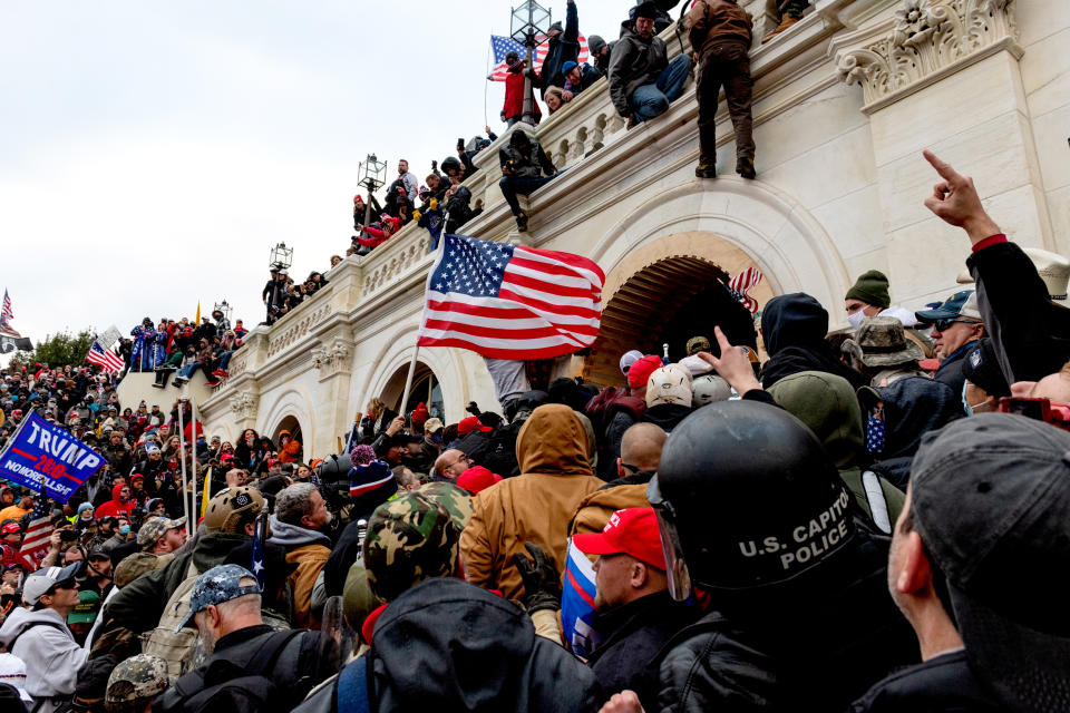 Demonstrators attempt to enter the U.S. Capitol building during a protest on Jan. 6, 2021.  (Eric Lee / Bloomberg via Getty Images file)