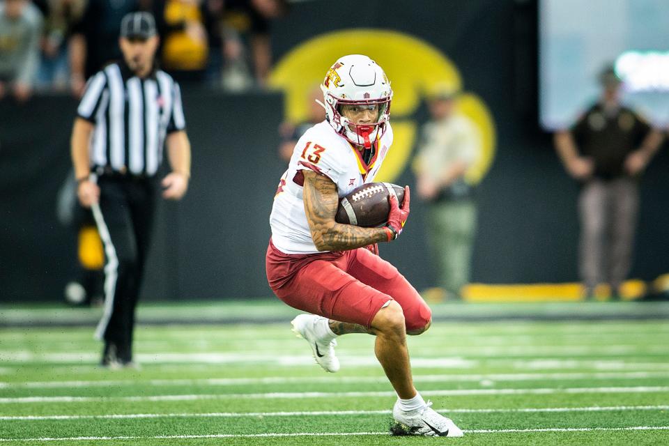 Iowa State wide receiver Jaylin Noel (13) runs for extra yards after making a catch during the Cyclones' win over Iowa