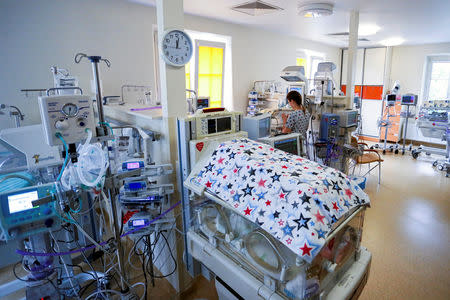 A nurse checks an incubator at the University Hospital in Krakow, Poland, 21 May 2019. Polish woman gave birth to four baby girls and two boys on Monday, the first sextuplets to be born in Poland. Agencja Gazeta/Adrianna Bochenek/via REUTERS