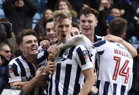 Britain Football Soccer - Millwall v Watford - FA Cup Fourth Round - The New Den - 29/1/17 Millwall's Steve Morison celebrates scoring their first goal Action Images via Reuters / Tony O'Brien Livepic EDITORIAL USE ONLY. No use with unauthorized audio, video, data, fixture lists, club/league logos or "live" services. Online in-match use limited to 45 images, no video emulation. No use in betting, games or single club/league/player publications. Please contact your account representative for further details.